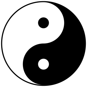 De Taijitu symboliseert de relatie tussen Yin (zwart) en Yang (wit).
